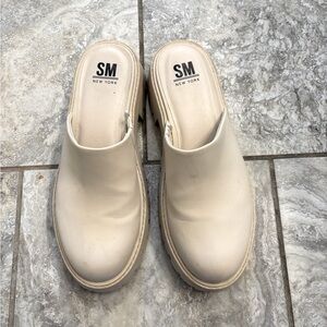 Cream clogs